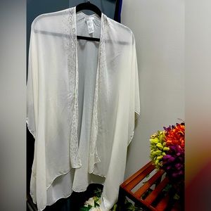 Calm off-white “creamy” women cape, beautiful silver gems on it.